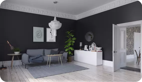 salon z czarną ścianą i białymi elementami